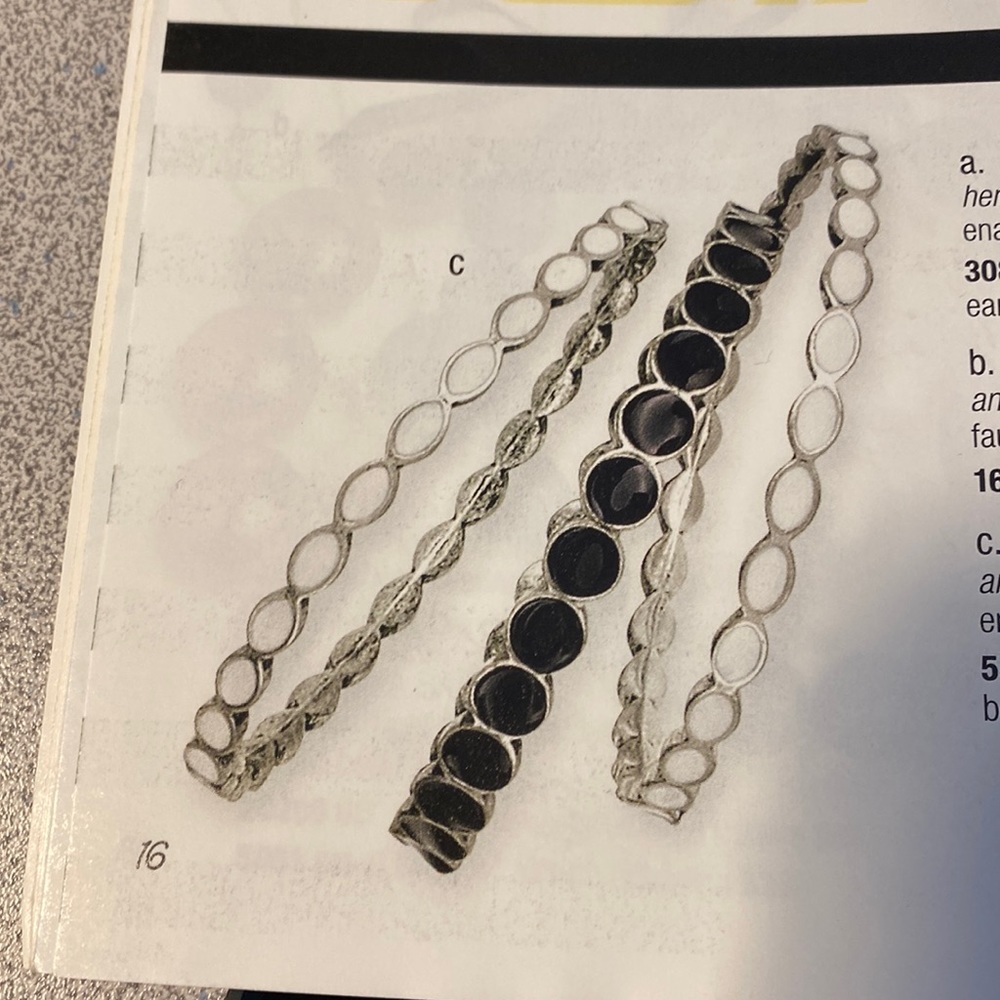 2B Premier Designs “Black and White” bangle bracelets.